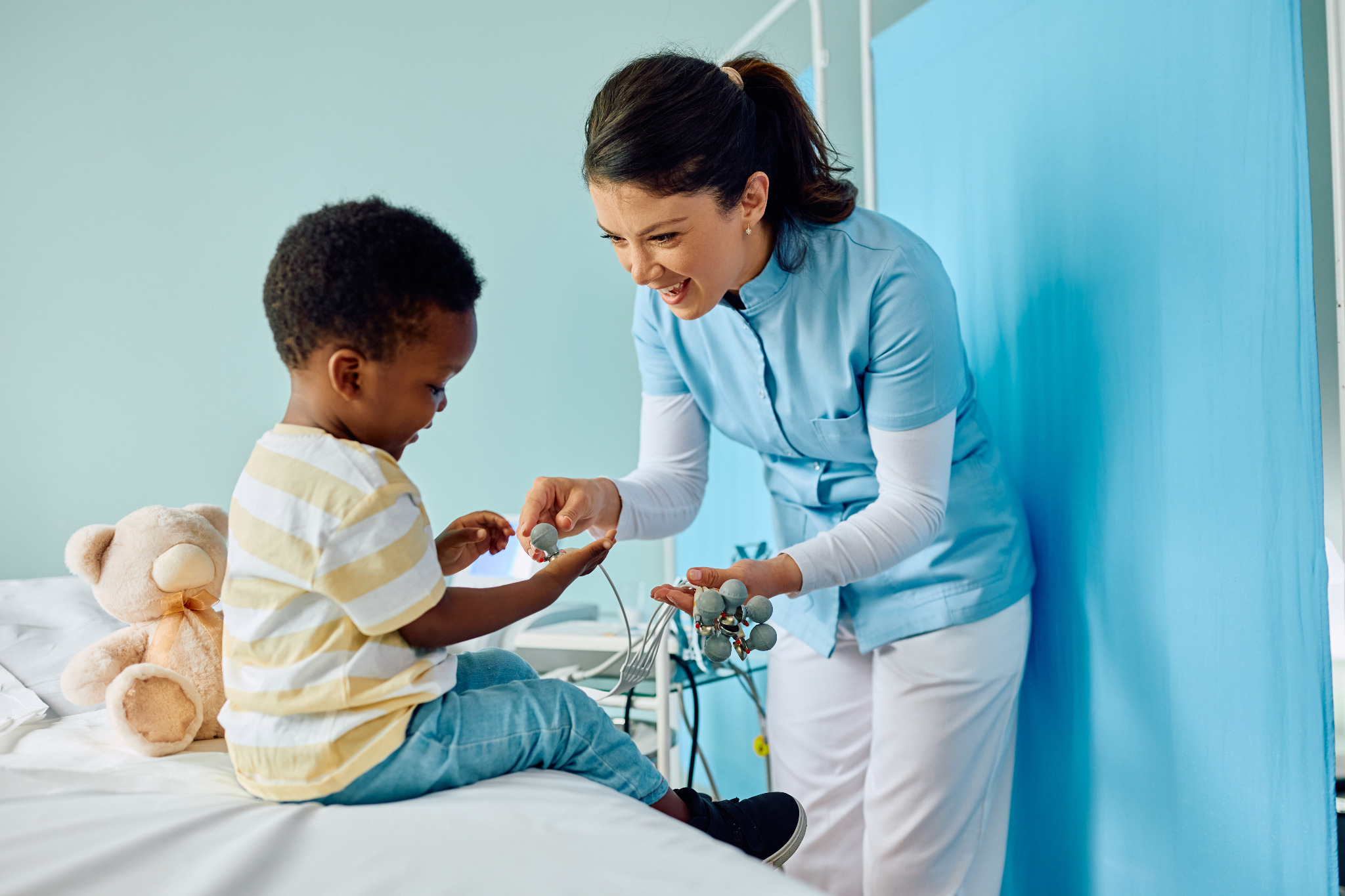 Care professional engaging positively with a child